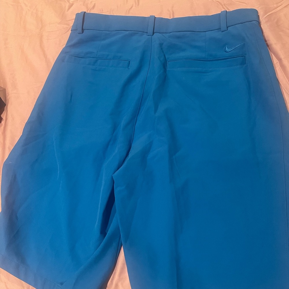 Three sets of men’s adidas and Nike  golf shorts